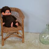 Child in rattan & Wicker Chair