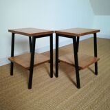 A pair of bedside tables