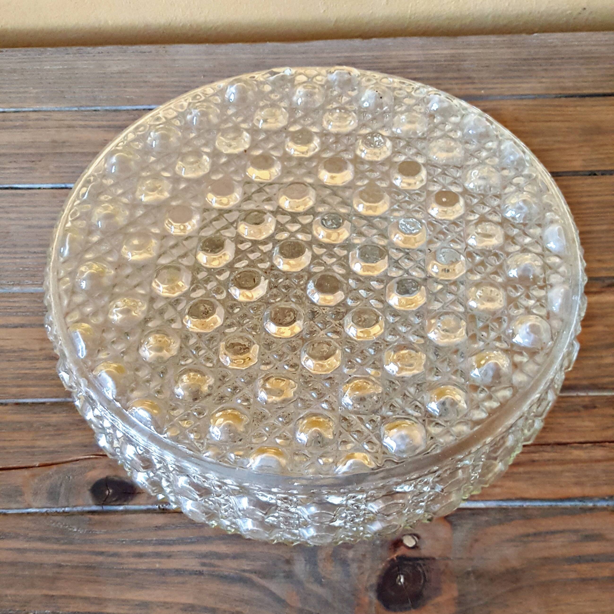 Round vintage wall lamp in transparent molded glass