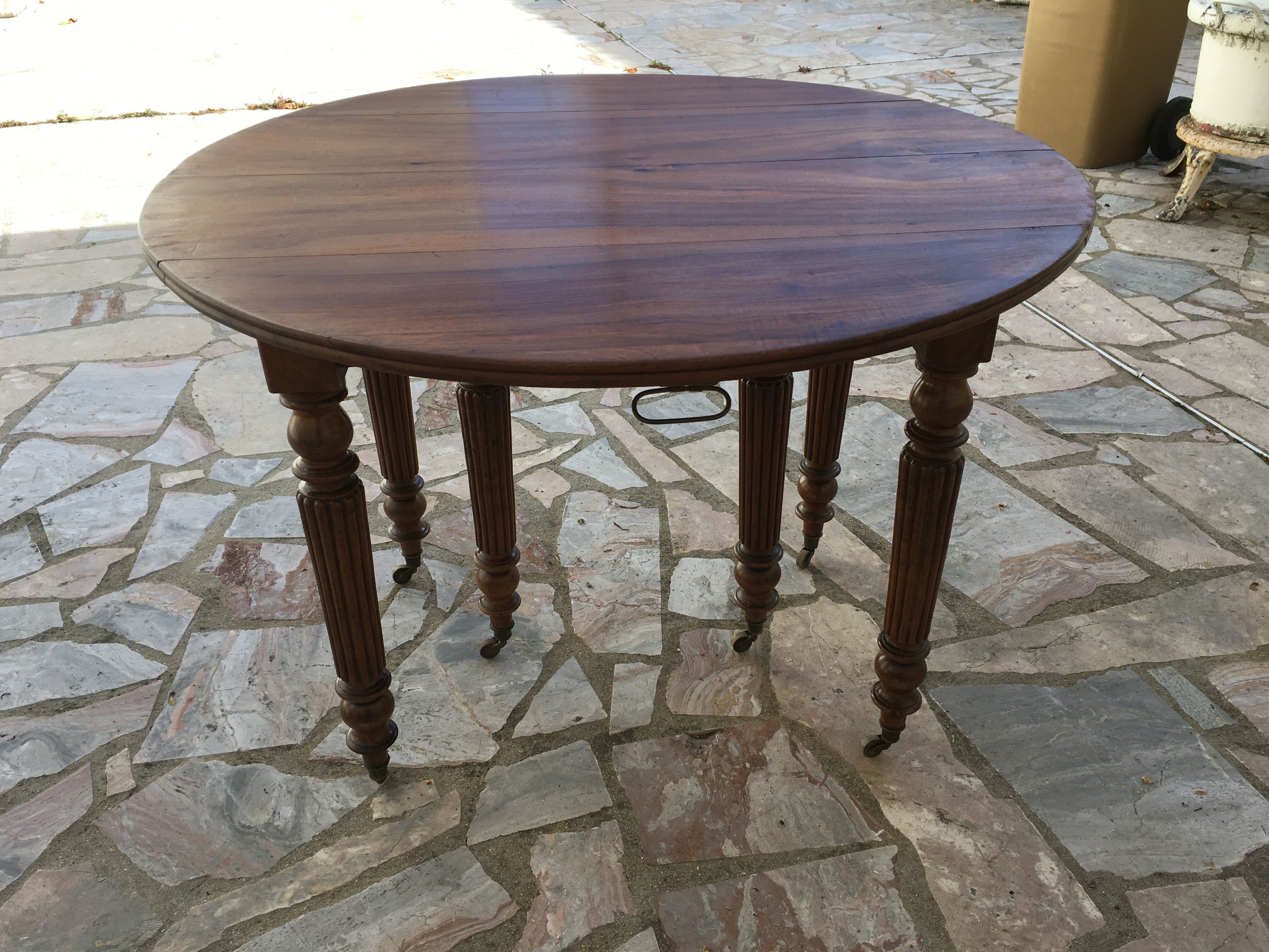 Round table 6 feet 3 solid walnut extensions