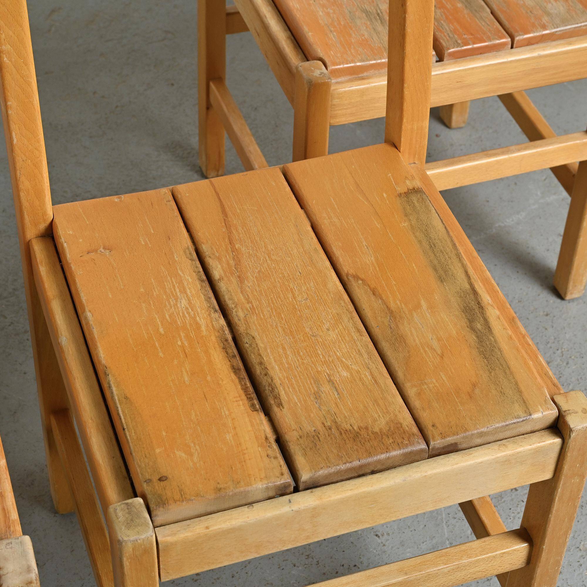 Set of six solid pine chairs by Maison Regain.