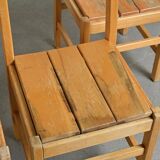 Set of six solid pine chairs by Maison Regain.