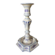 Antique Gien candlestick with ribbon and garland decoration.