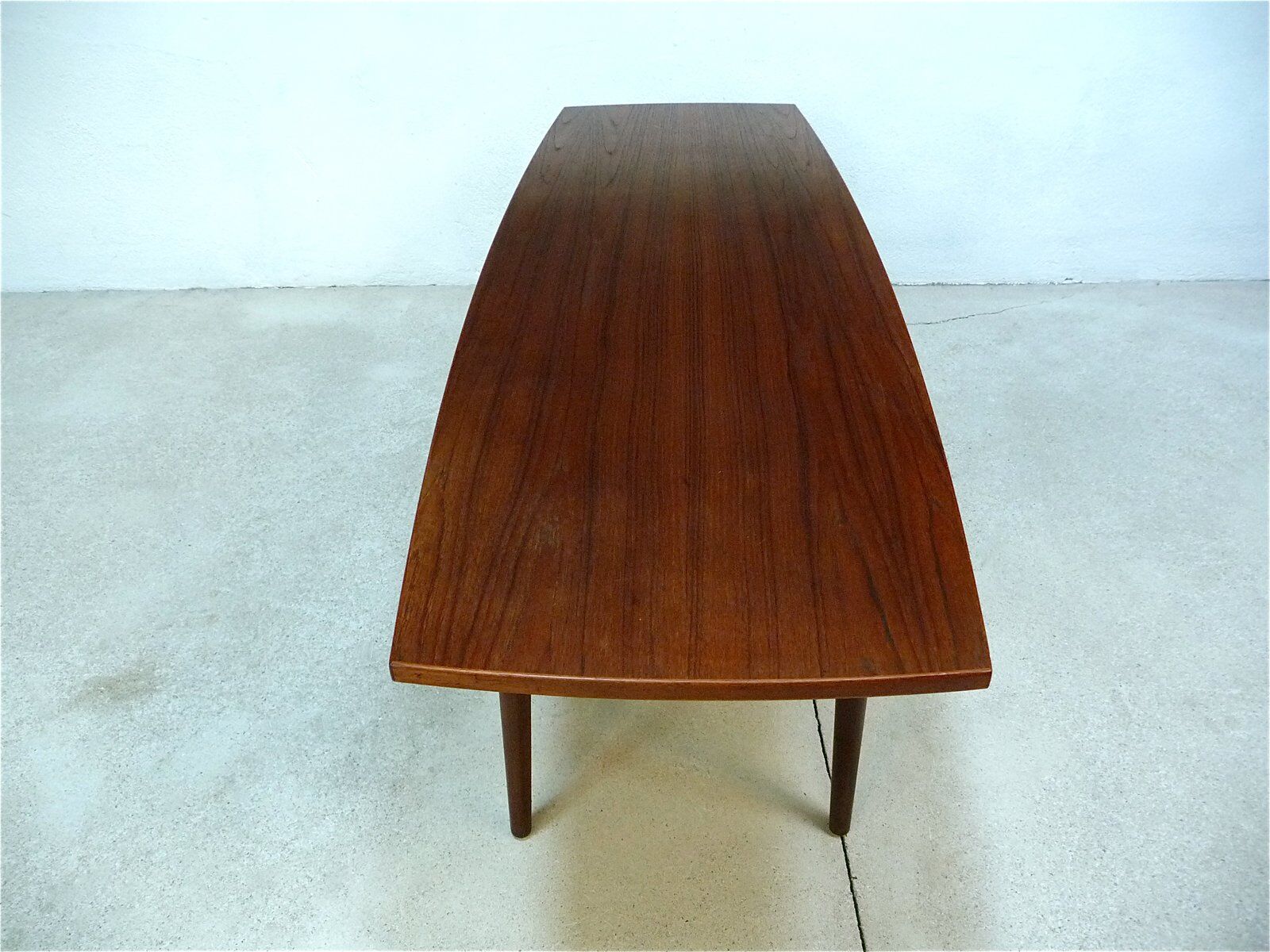Curved Danish teak coffee table with additional shelf compartment, 1960s
