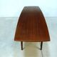 Curved Danish teak coffee table with additional shelf compartment, 1960s