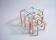 Three nesting tables from the 90s made of painted metal and tempered glass.