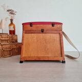 Old fisherman's stool with red seat