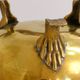 Planter on lion legs, made of golden metal