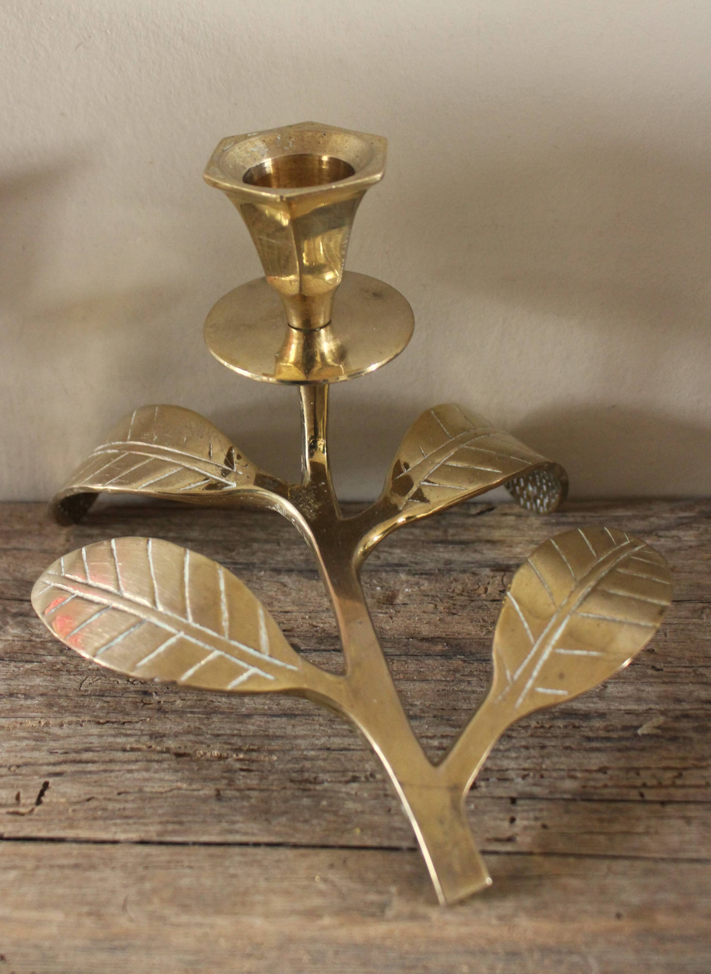 Brass candle holder with oval leaf branch
