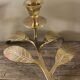 Brass candle holder with oval leaf branch
