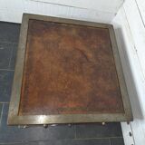 Table basse vintage en acier et cuir