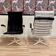A PAIR OF METAL AND BAKELITE ARMCHAIRS.
