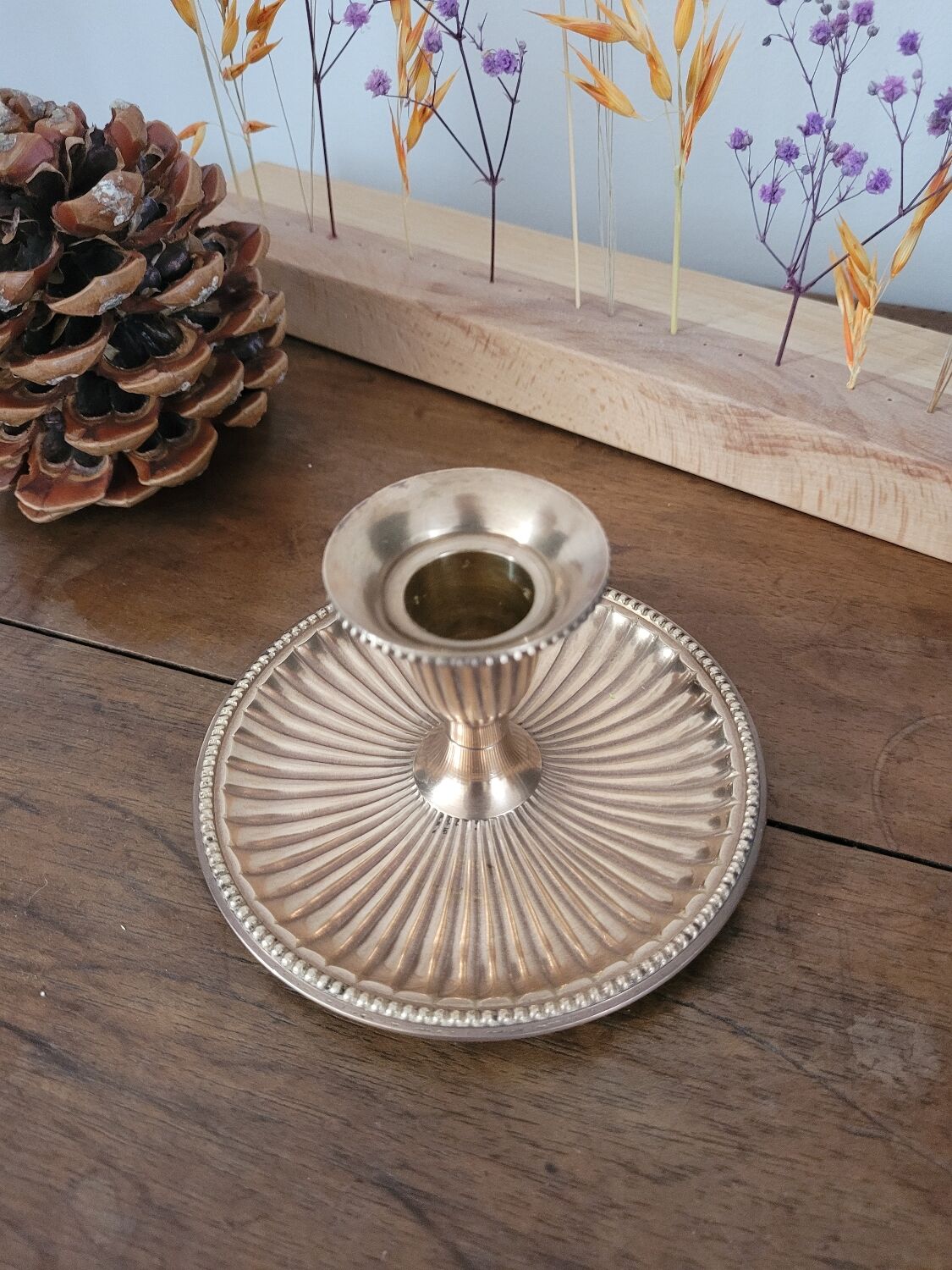 Brass candlestick with a ribbed dish