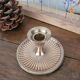 Brass candlestick with a ribbed dish