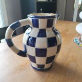 Blue and white checkerboard water pitcher