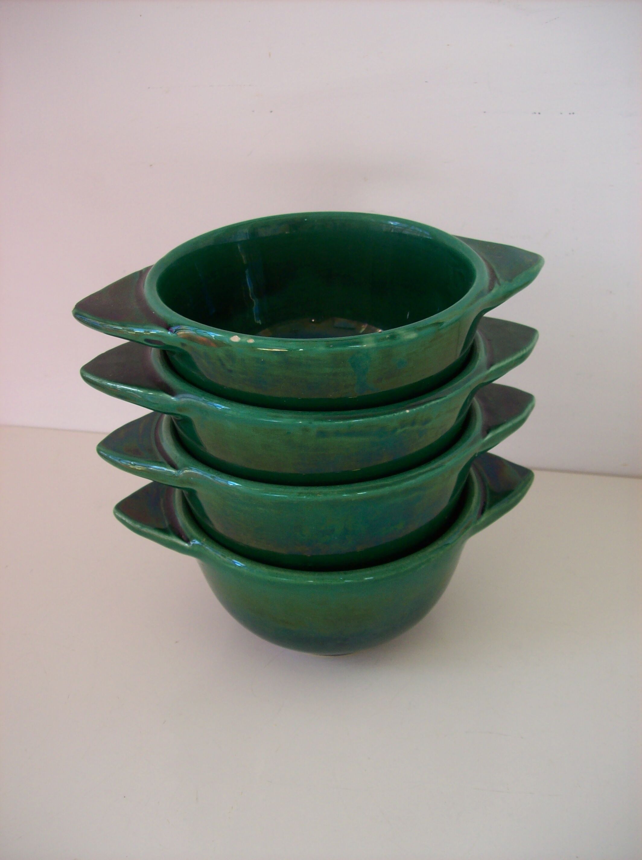 Suite of four former St. Clement bowls