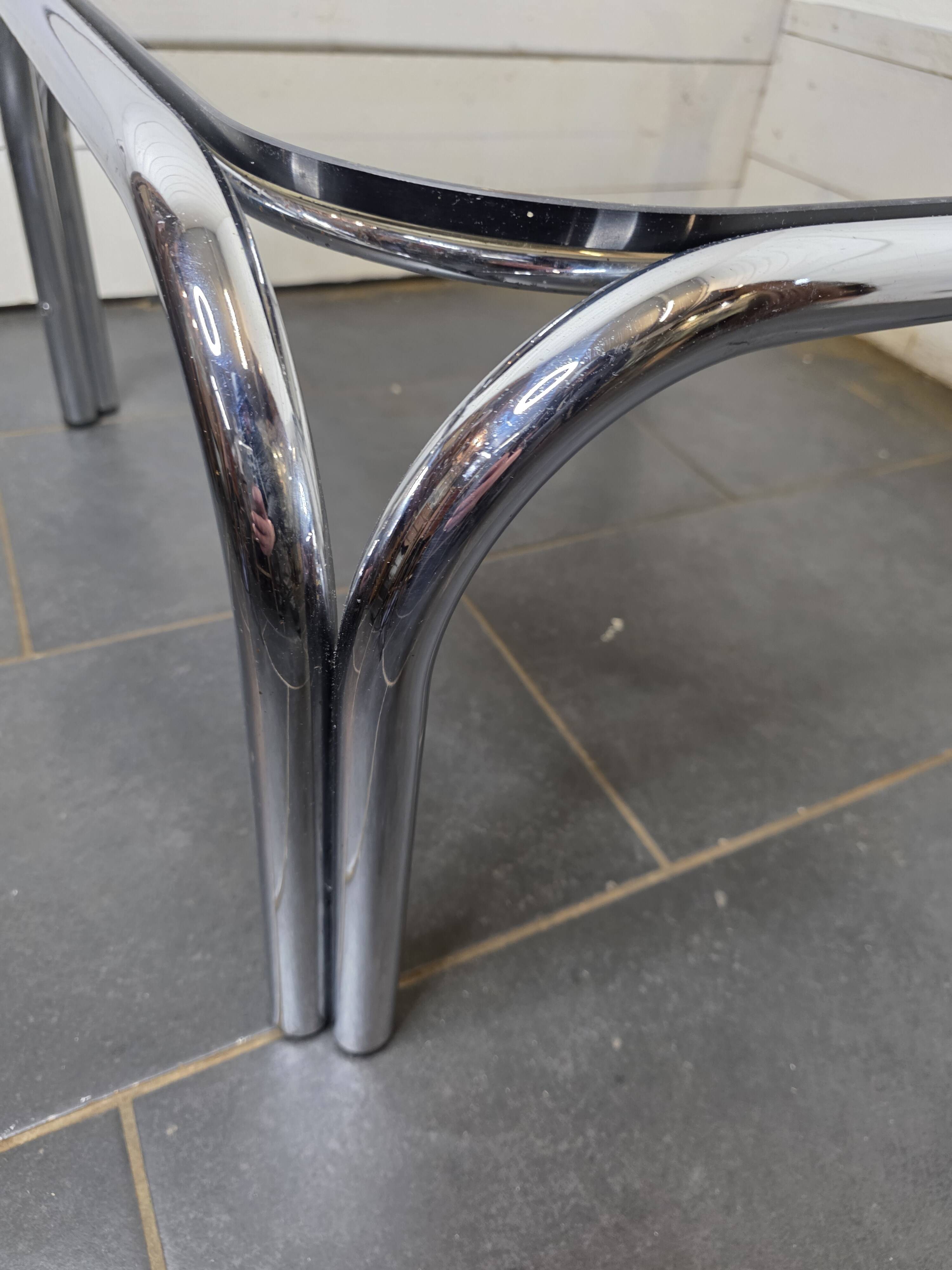 Chrome metal coffee table with smoked glass top from the 70s