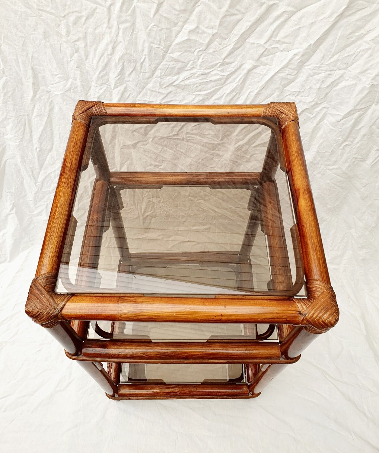 Rattan and smoked glass side table