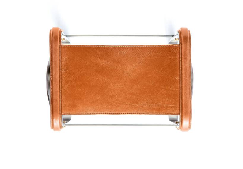 Pair of backless stools in tobacco colour with metal finishes.