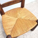 Low chair in turned wood and straw