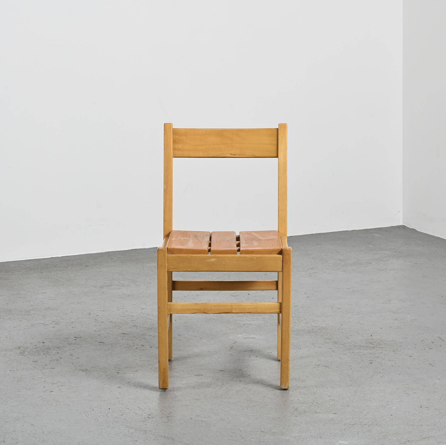 Suite of four chairs in the style of Maison Regain