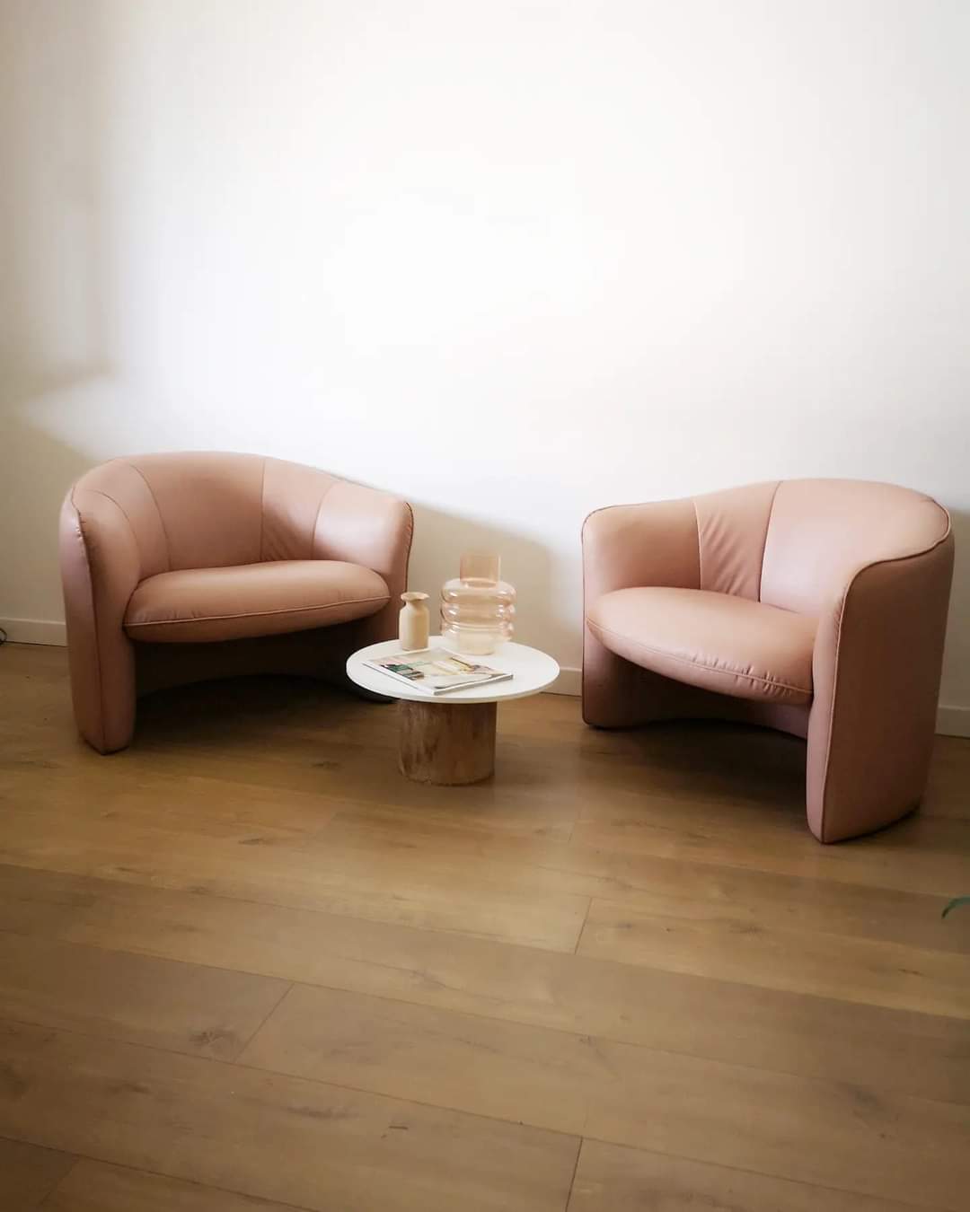 Pair of pink skai armchairs