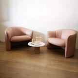 Pair of pink skai armchairs