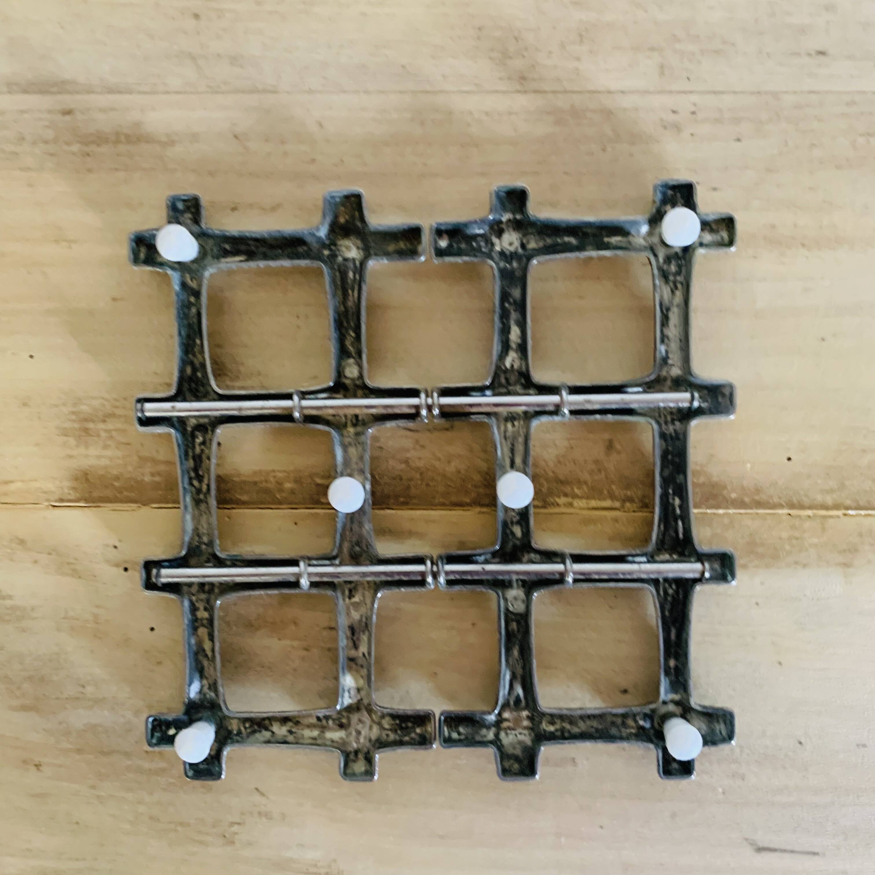 Silver metal table mat imitating bamboo