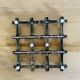 Silver metal table mat imitating bamboo