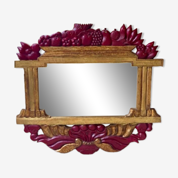 Grand miroir italien dans le goût art déco en bois doré à décor de fruits