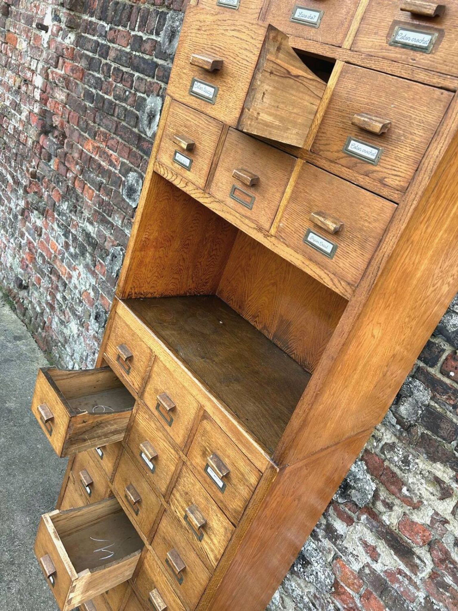 Large vintage workshop furniture with 30 drawers, antique haberdashery compartments.