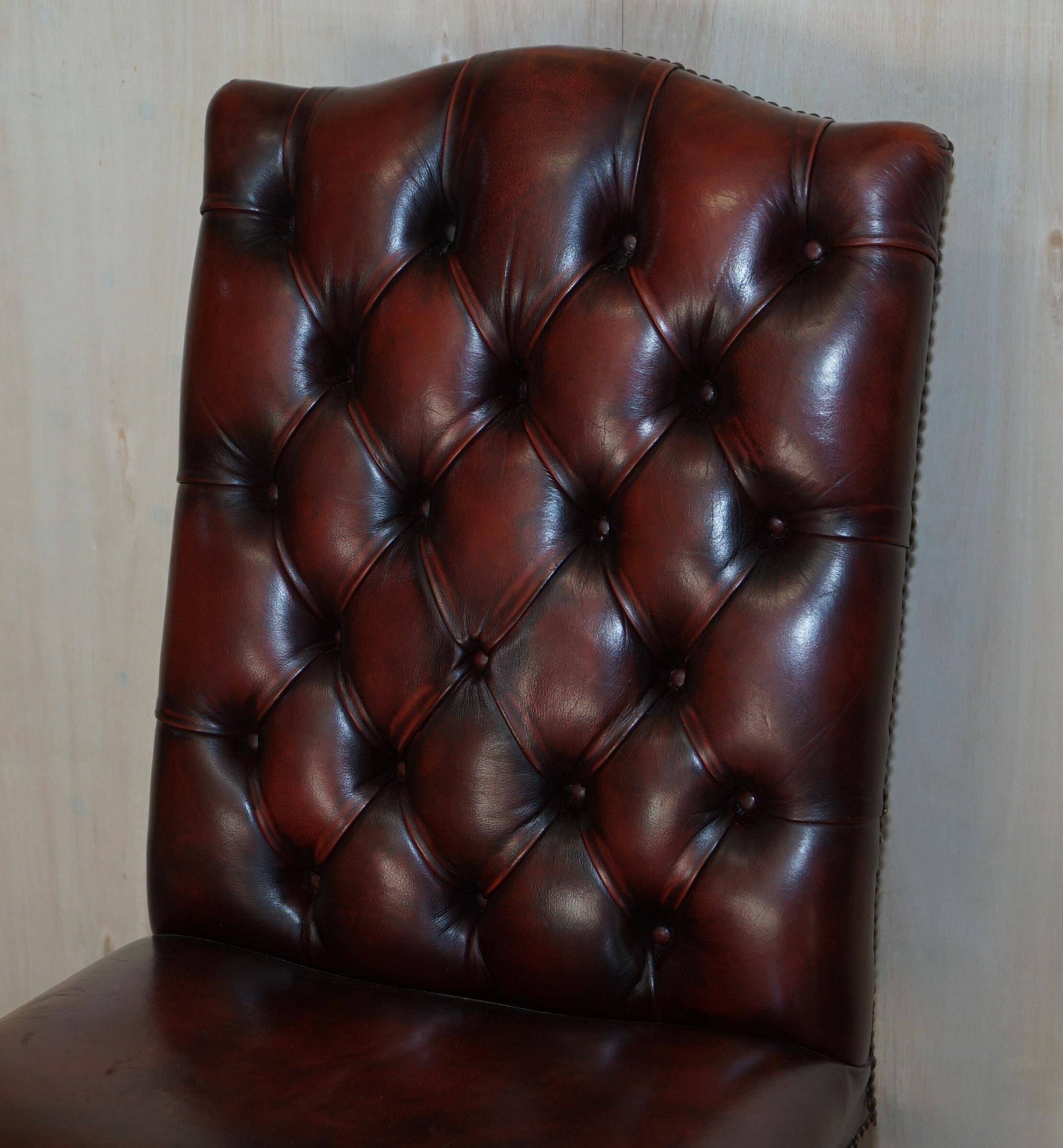 Pair of vintage leather Chesterfield accent chairs