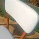 vintage wooden chairs with white faux leather