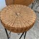 Vintage 1950s bar counter with its two rattan and metal stools.