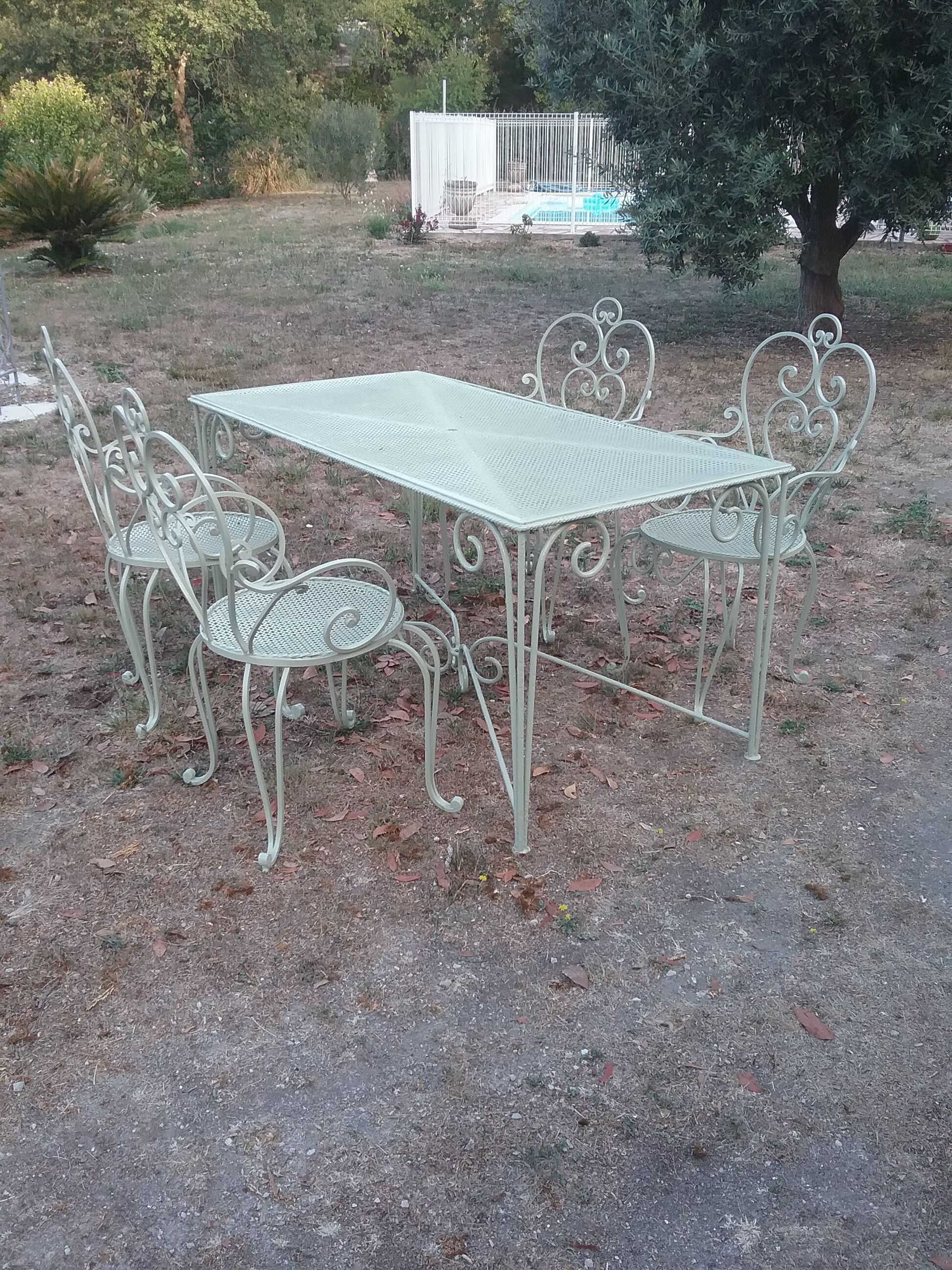 Garden furniture in green wrought iron
