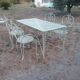 Garden furniture in green wrought iron