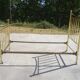 Antique gold-plated brass bed for one person.