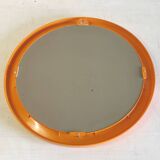 Round orange plastic mirror - 1970s