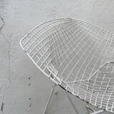 Pair of armchairs in white patinated mesh metal.