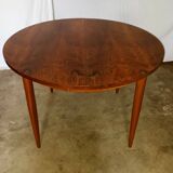 Table ronde en palissandre avec rallongedes années 70