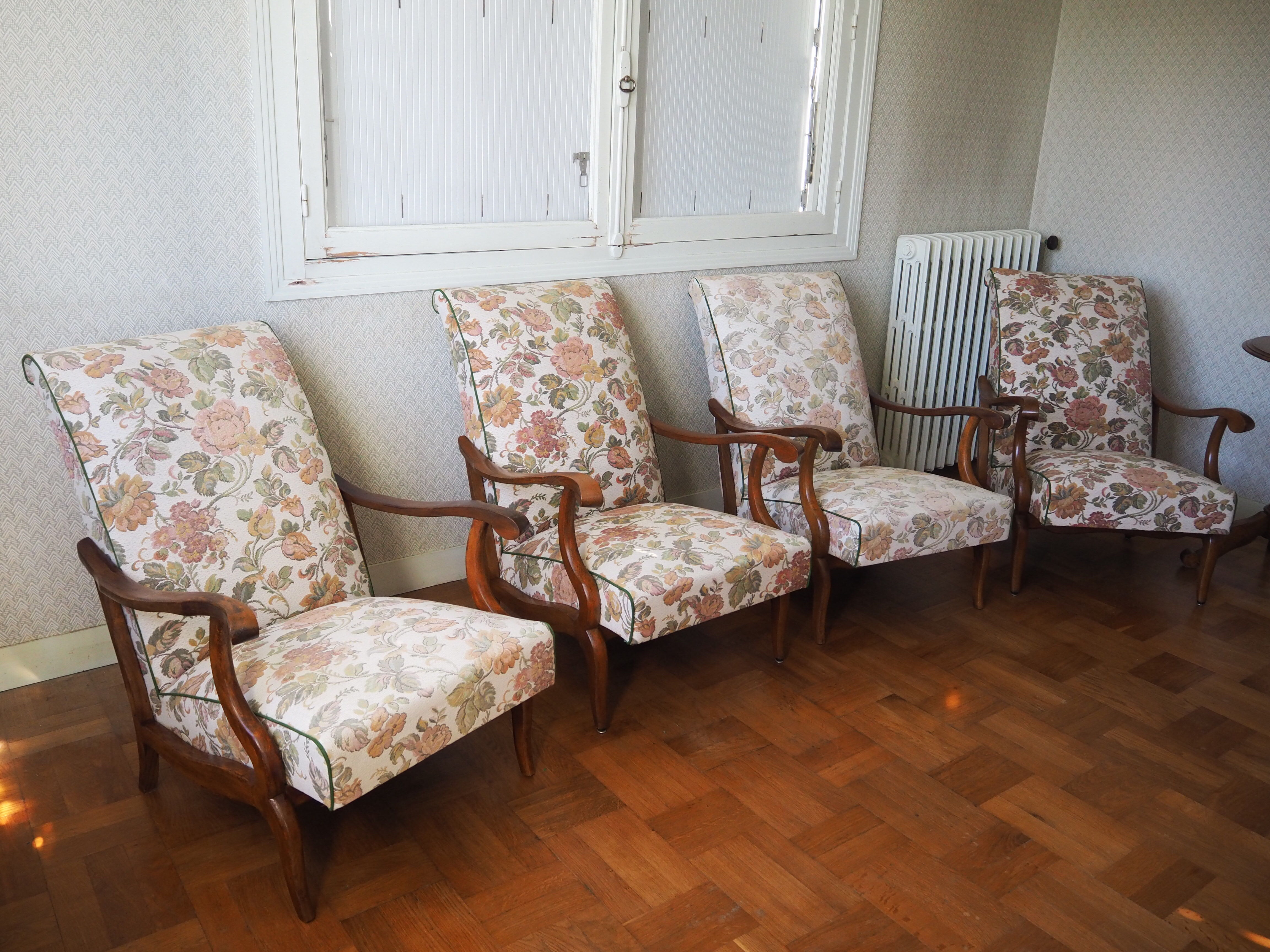 Four 1950s armchairs - wooden armrests