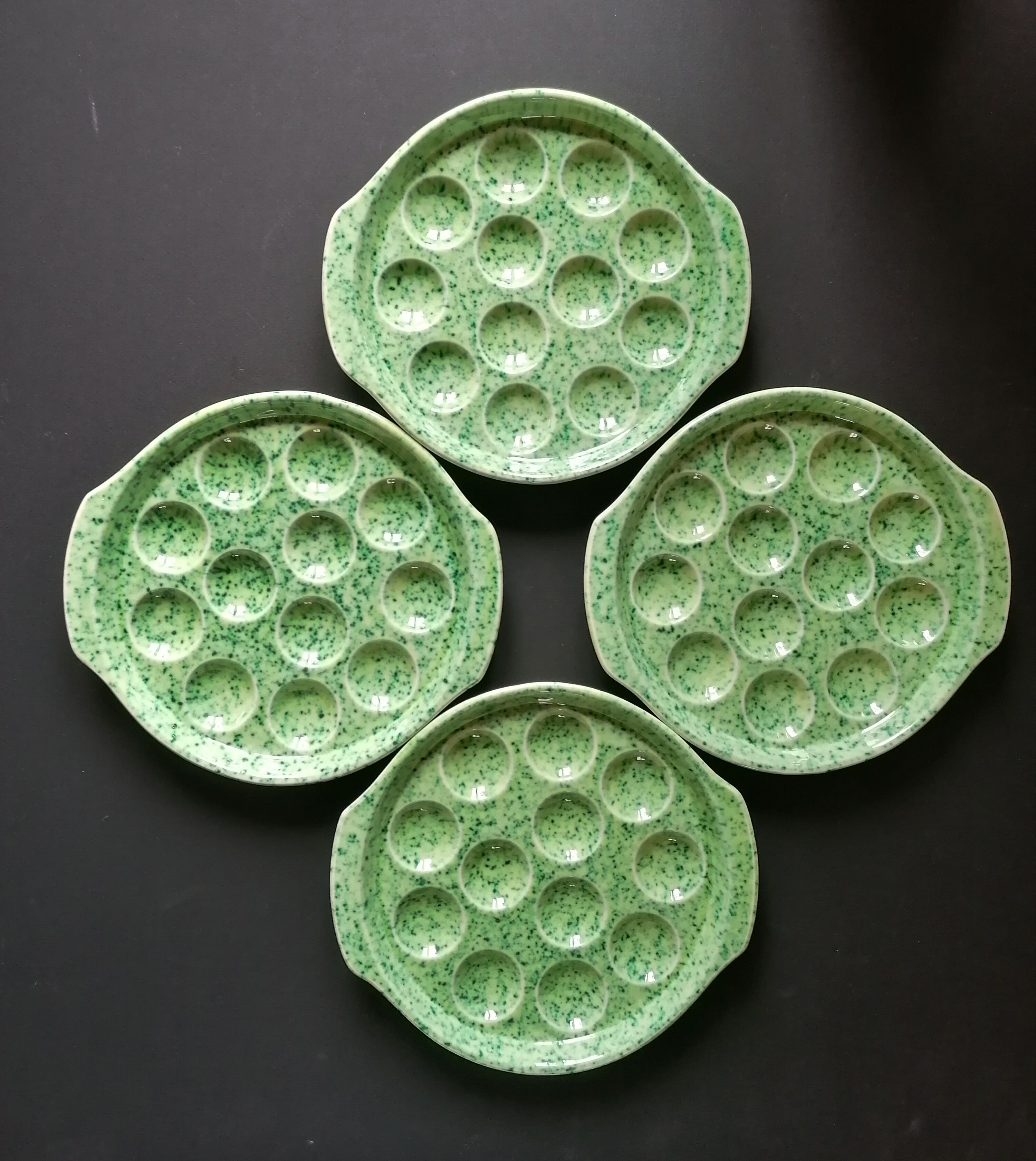 4 plates with gien porcelain snails