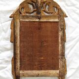 Miroir en bois doré, style Louis XVl, début XXe