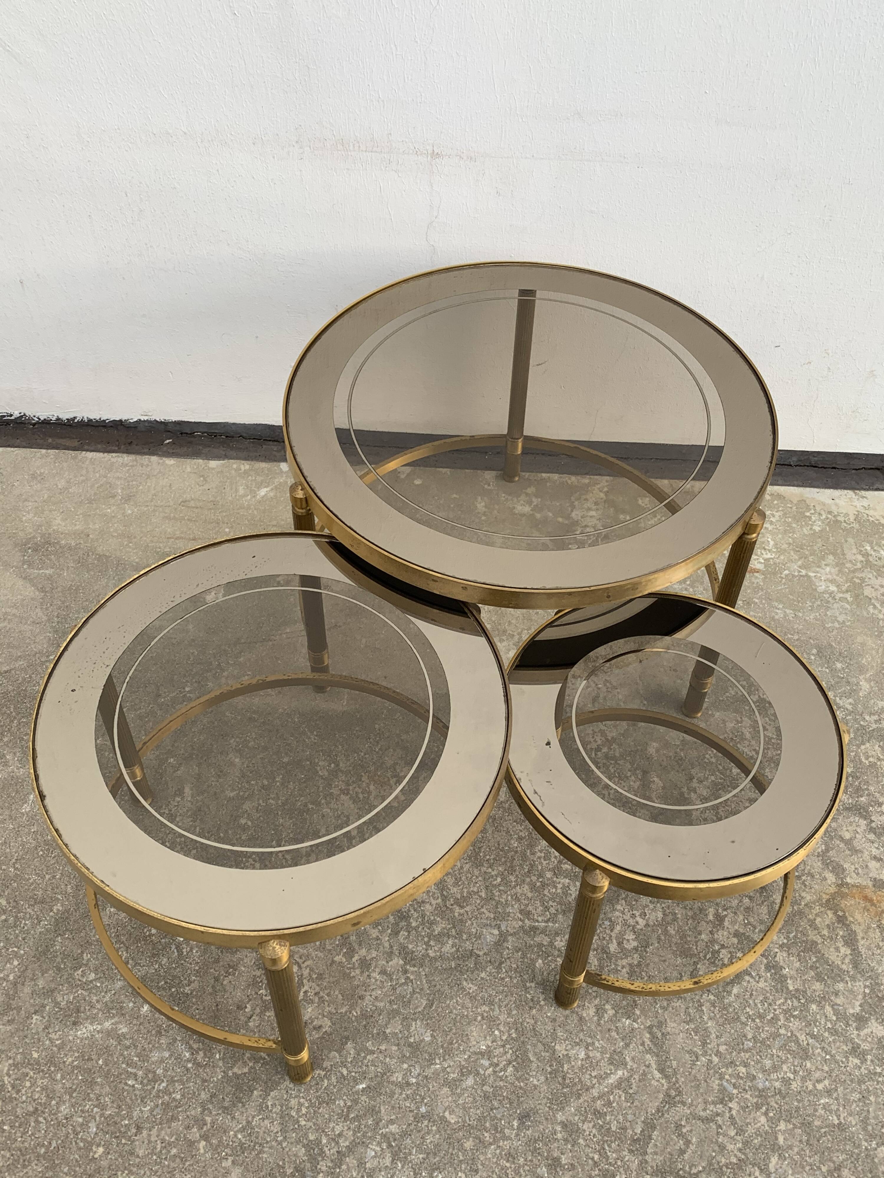 Three round brass tables 1970