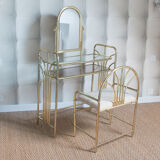 Dressing table in gold metal