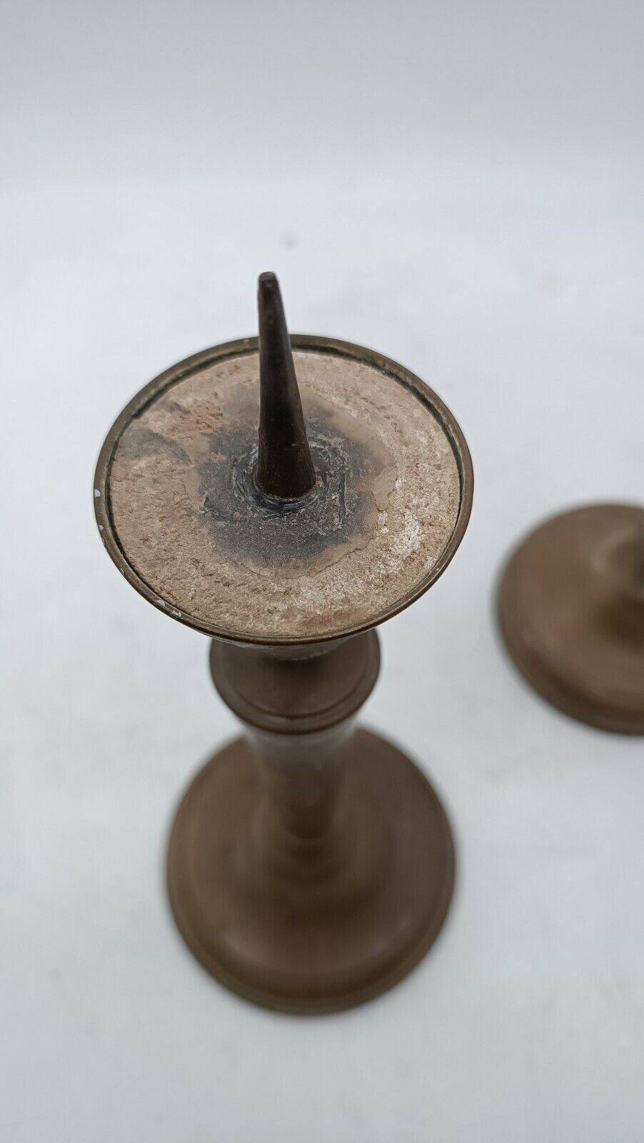 Pair of antique bronze candelabras