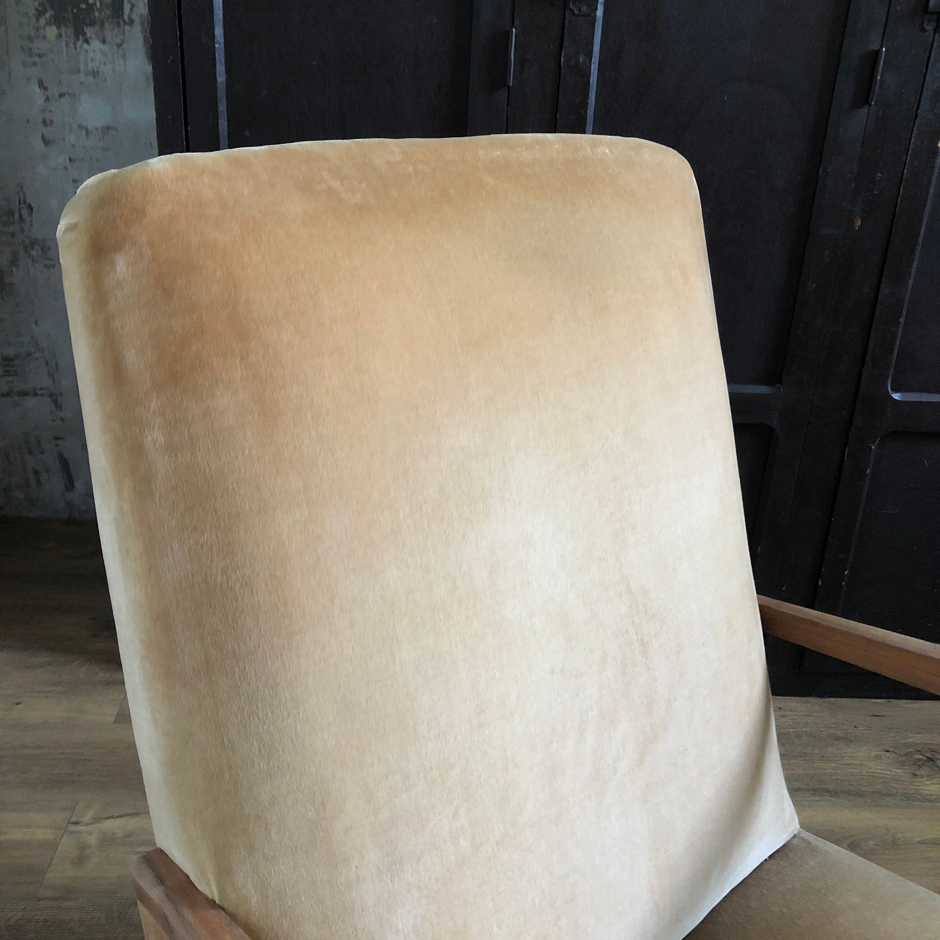 Velvet and wood armchair