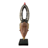 African wooden mask to pose