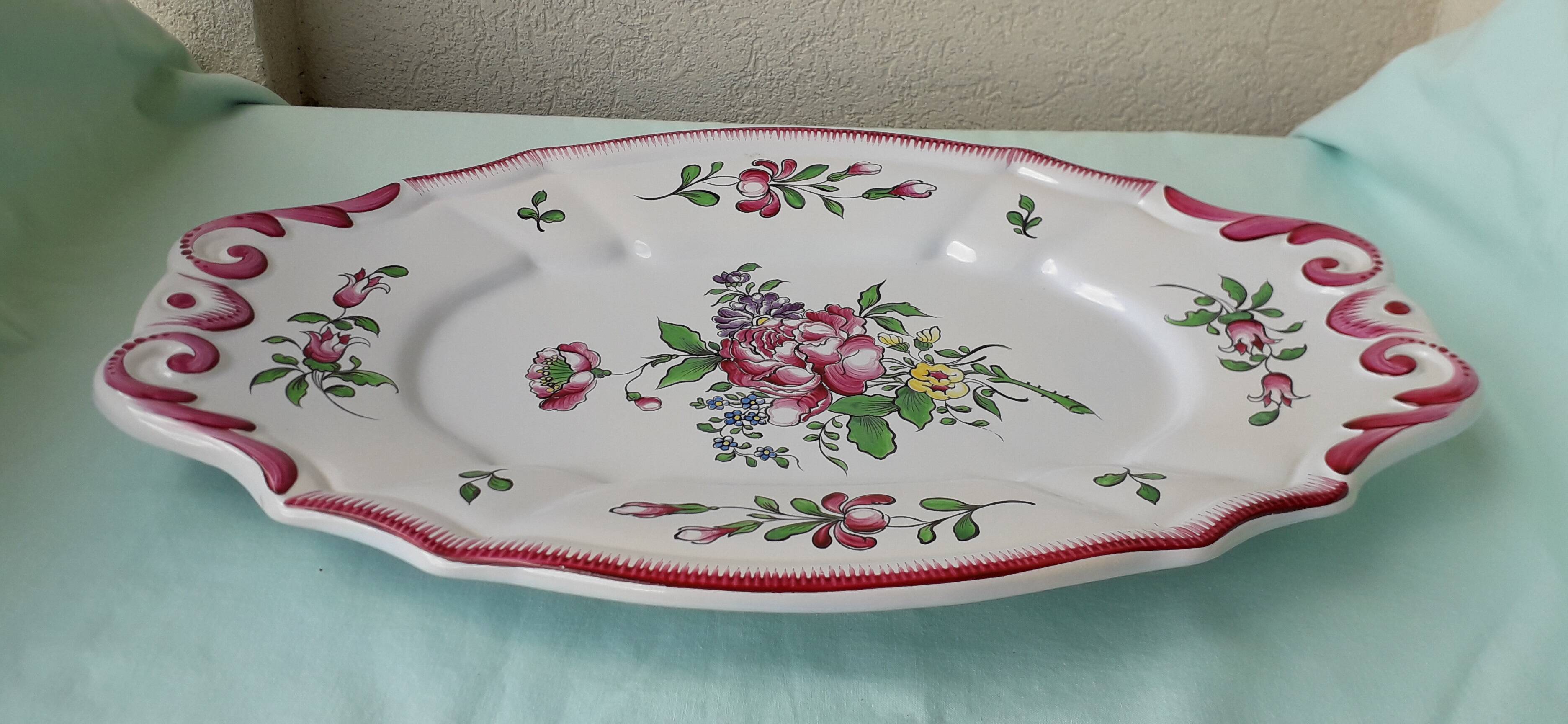 Plat ovale en faïence style Lunéville