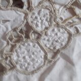 Linen centerpiece fully hand-embroidered.